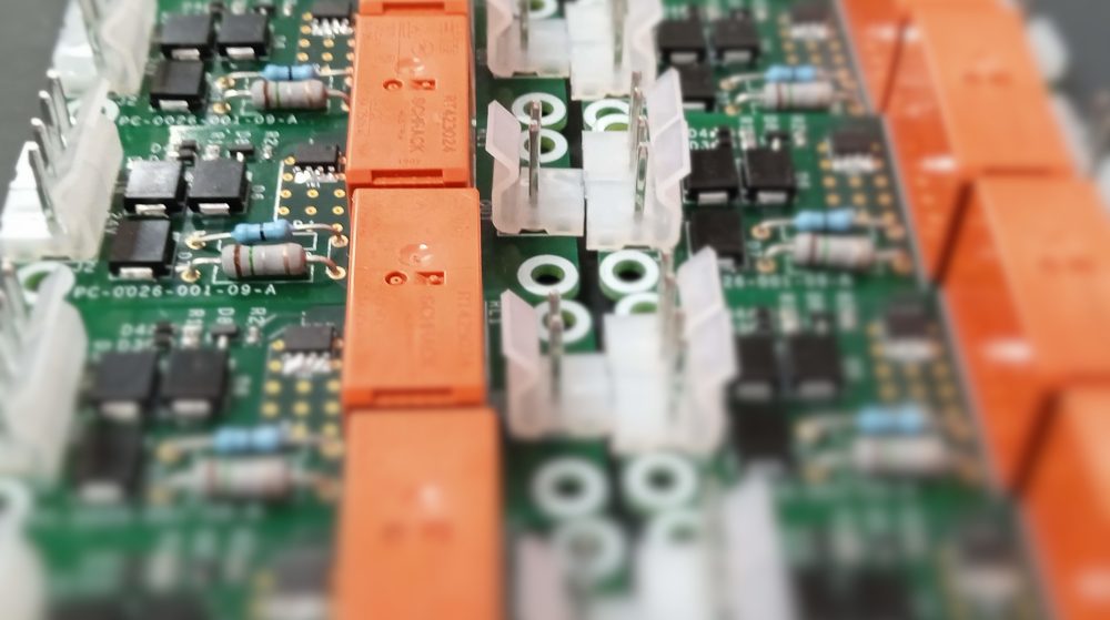 Close up of printed circuit board showing various electronic components