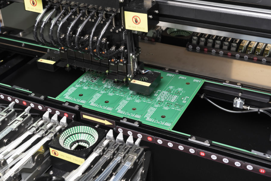 PCB assembly pick and place machine in action