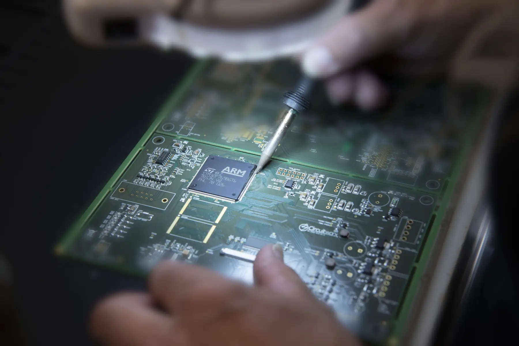 Surface mount soldering hand assembly of PCB
